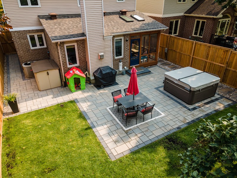 photo of Patio, Walkway, Hot-tub pad, retaining wall step, stepping stones in a backyard